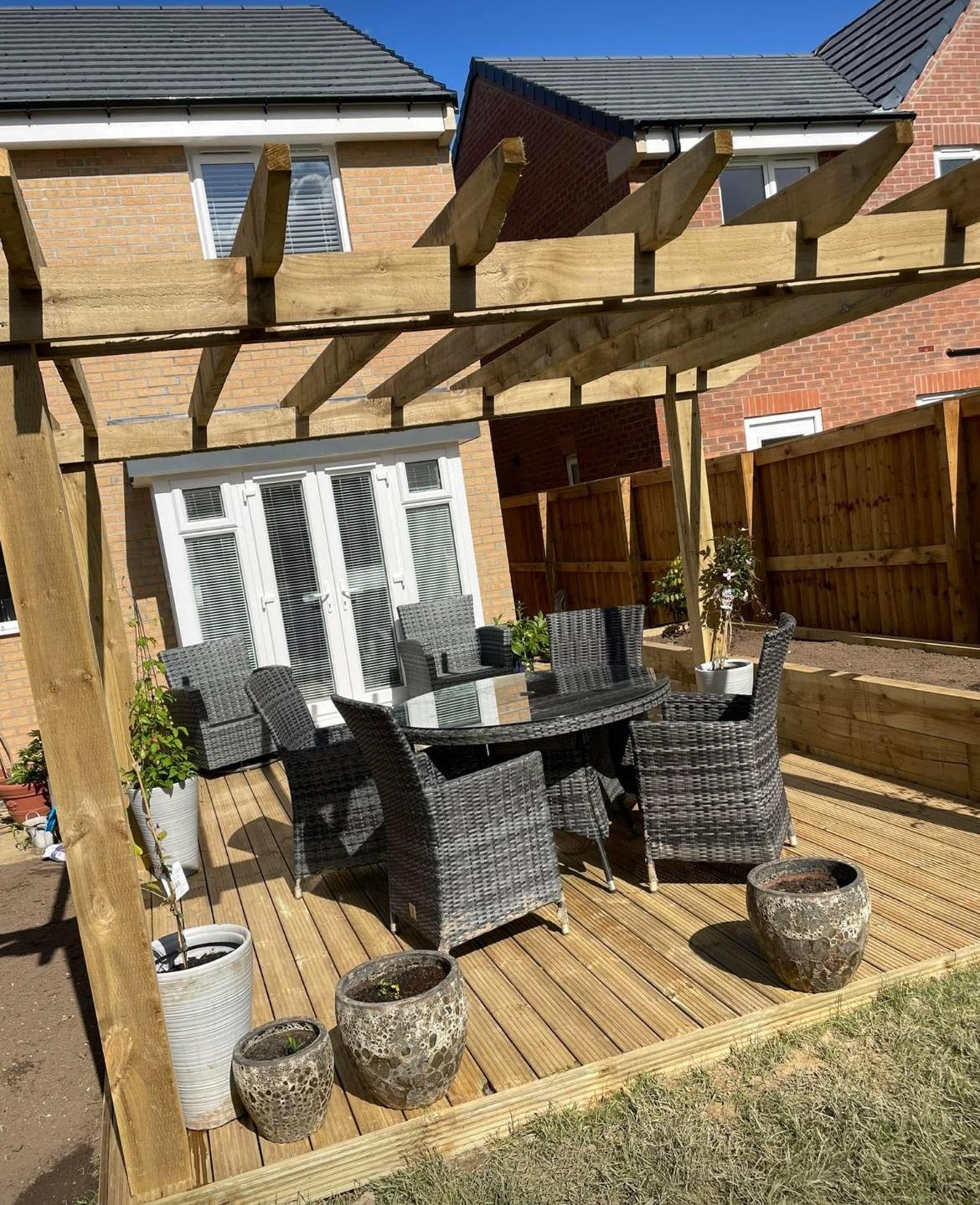 Timber deck beneath an open pergola